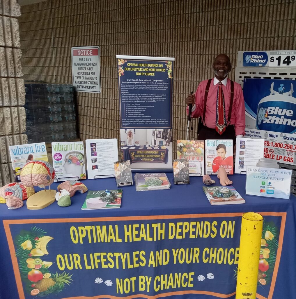 Richard Frazier and pop up table with educational materials